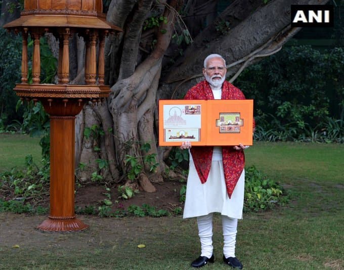 PM Narendra Modi With Postal Ticket Book 