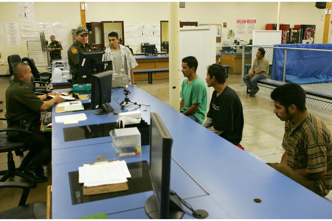 Customs and Border Protection agents at the Rio Grande Valley in Texas process undocumented immigrants
