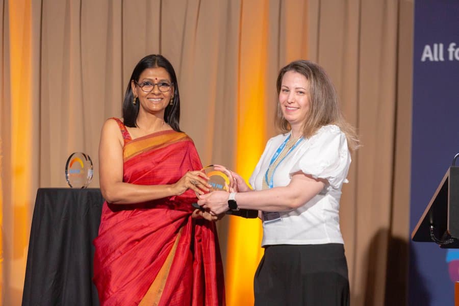 Nandita Das handing over an award at the film festival.