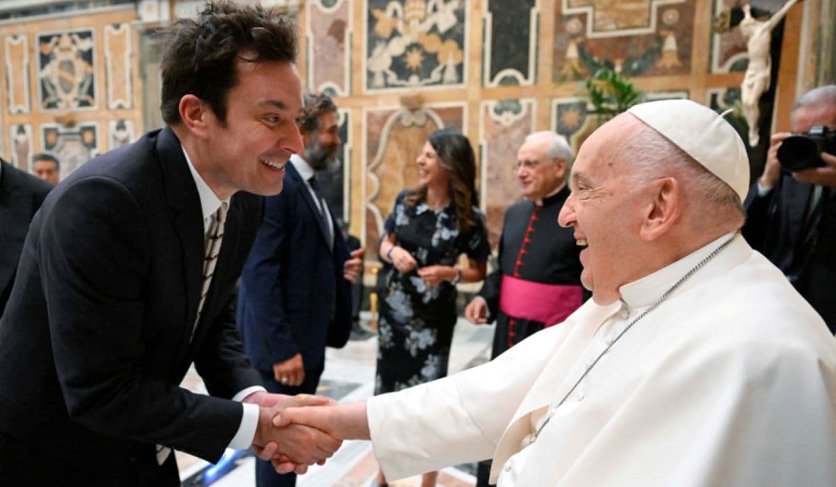 Pope Francis greets Jimmy Fallon as he meets with comedians during a cultural event at the Vatican.