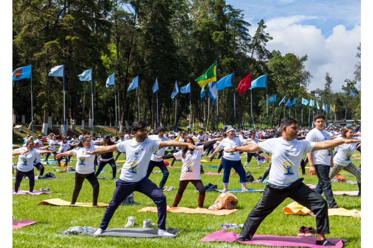 This year's theme, Yoga for Self and Society, highlights how yoga aids individual health and fosters community harmony.