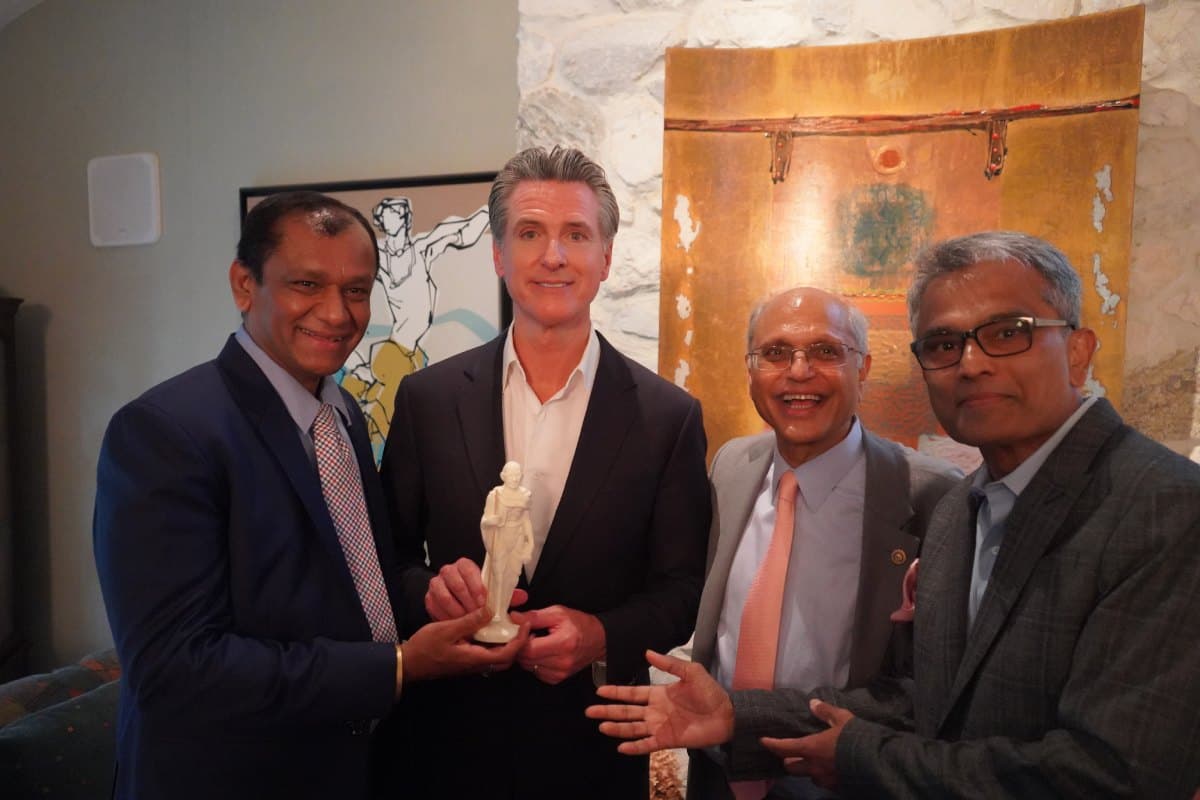 USISC President Ramesh Viswanath Kapur honoring Governor Gavin Newsom. 