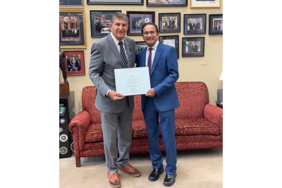Senator Joe Manchin, an Independent from West Virginia, presenting the President’s Lifetime Achievement Award to Dr. Satheesh Kathula on September 19, 2024, at the Hart Senate Building in Washington DC.