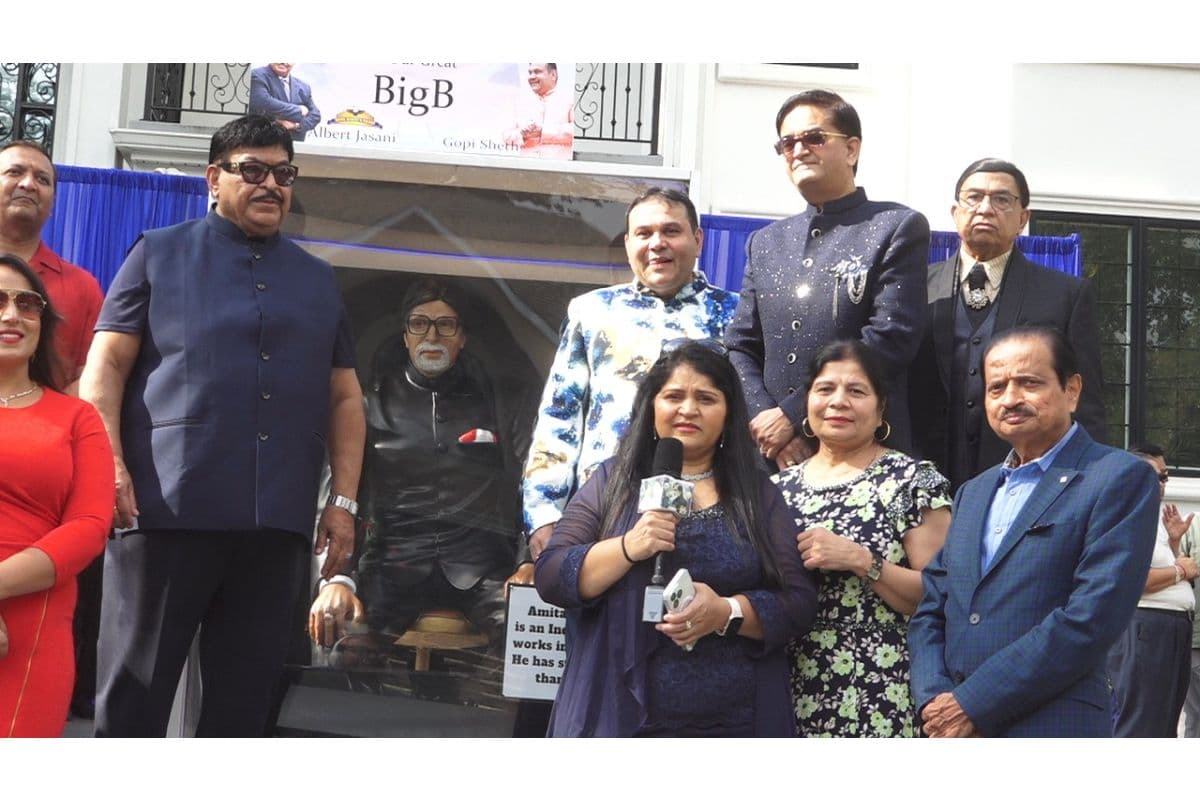 Indian-American Gopi Sheth with his wife and other fans. 