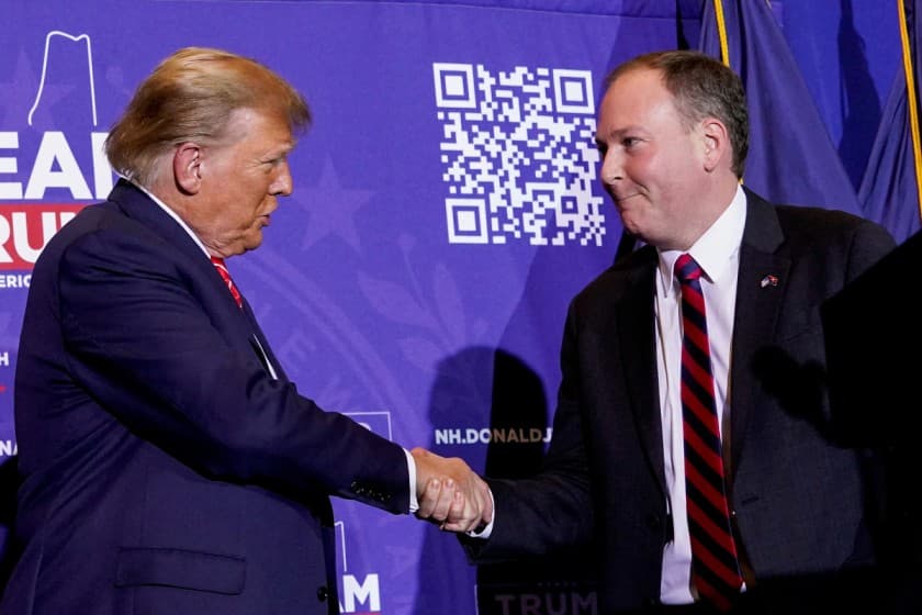 Former U.S. President and Republican presidential candidate Donald Trump greets former U.S. Representative Lee Zeldin at a rally ahead of the New Hampshire primary election in Concord, New Hampshire, U.S. January 19, 2024. REUTERS/Elizabeth Frantz/File Photo
