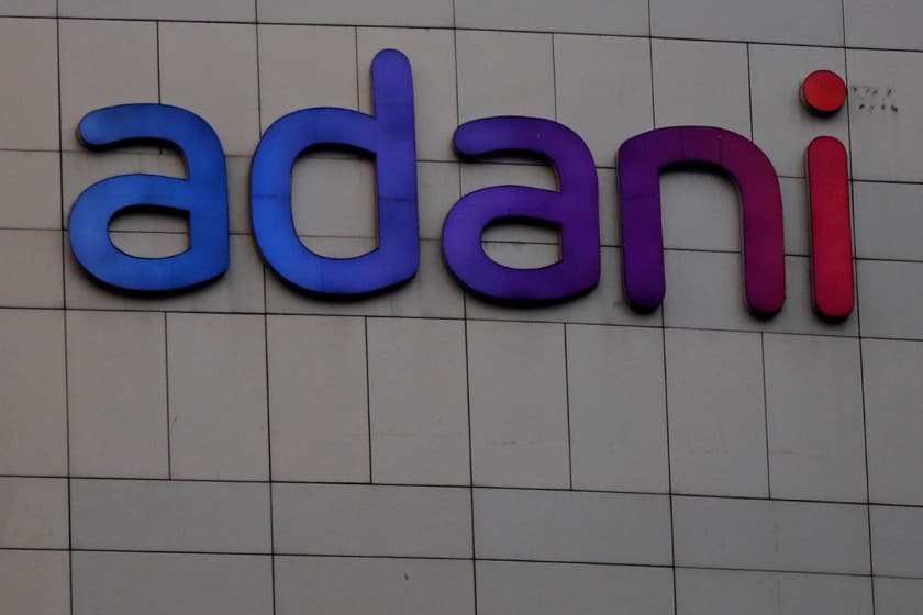 The logo of the Adani Group is seen on the facade of its Corporate House on the outskirts of Ahmedabad, India, January 27, 2023. REUTERS/Amit Dave/File Photo