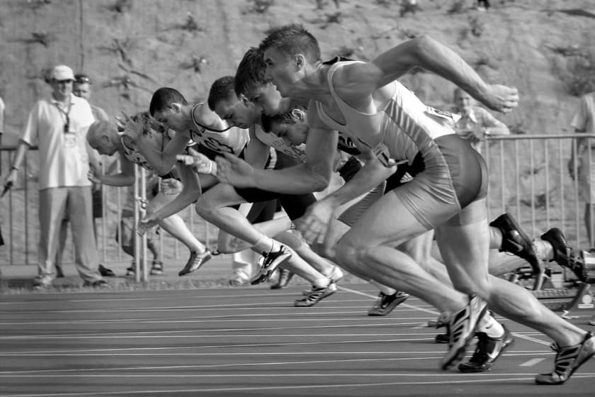 Athletes Running on Track 