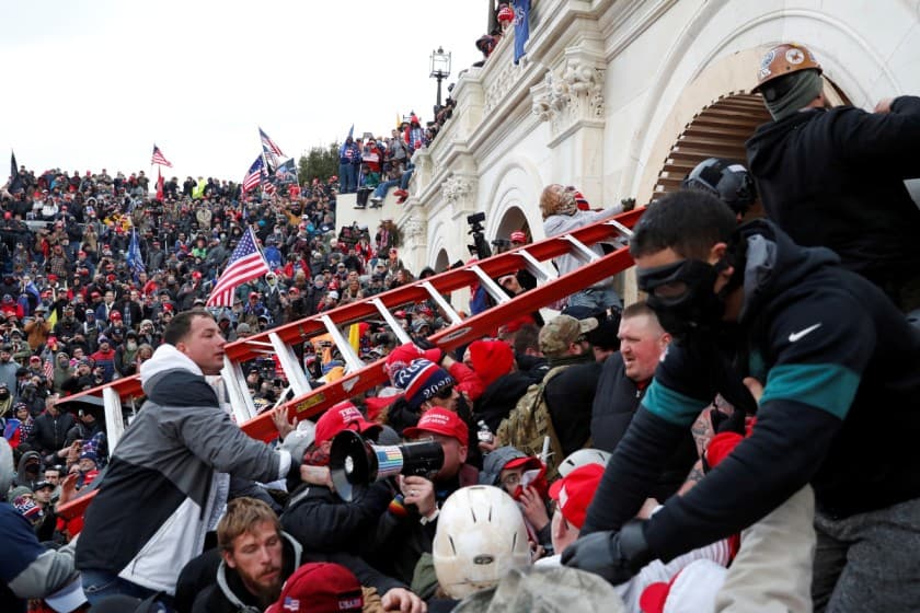 Pro-Trump protesters storm into the U.S. Capitol during clashes with police, during a rally to contest the certification of the 2020 U.S. presidential election results by the U.S. Congress, in Washington, U.S, January 6, 2021. REUTERS/Shannon Stapleton/File Photo
