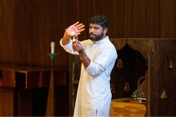 Every Friday, Persaud leads students in an aarti service at Cannon Chapel. 