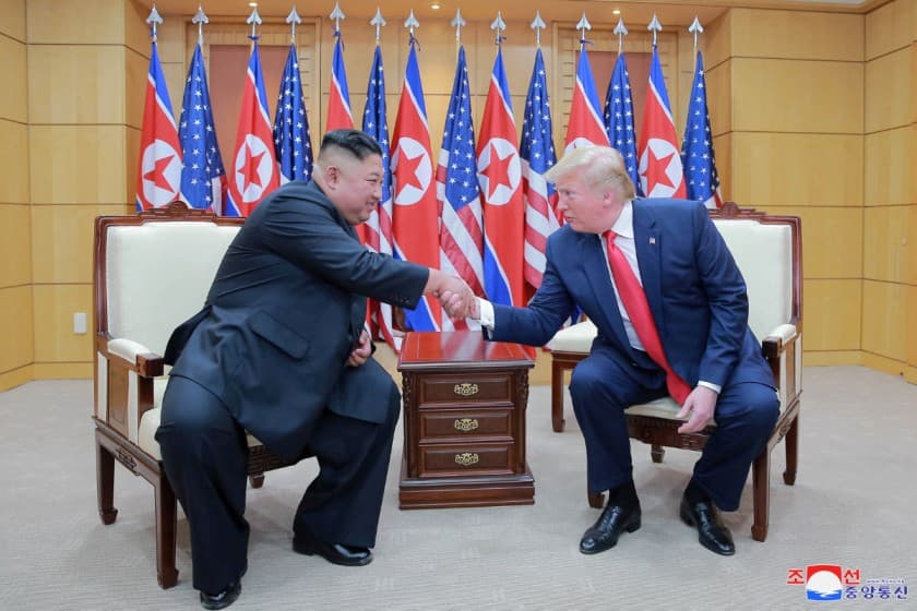 U.S. President Donald Trump and North Korean leader Kim Jong Un shake hands during a meeting at the demilitarized zone (DMZ) separating the two Koreas, in Panmunjom, South Korea, June 30, 2019. KCNA via REUTERS/File Photo