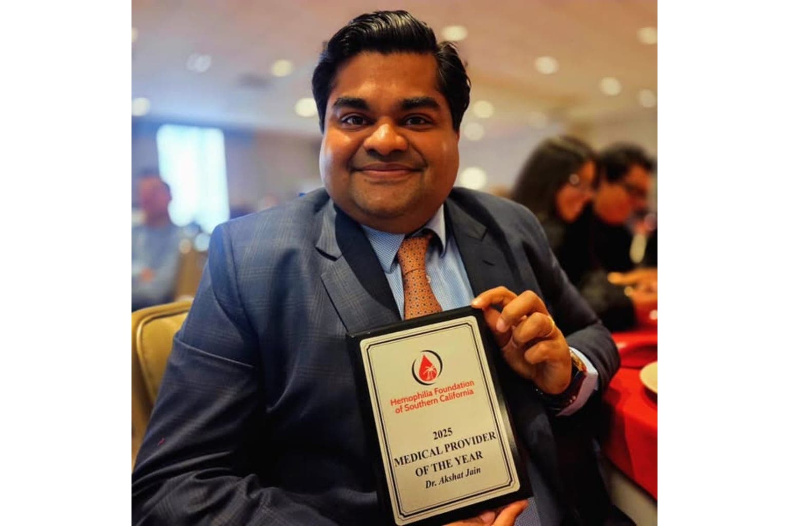 Akshat Jain with the award