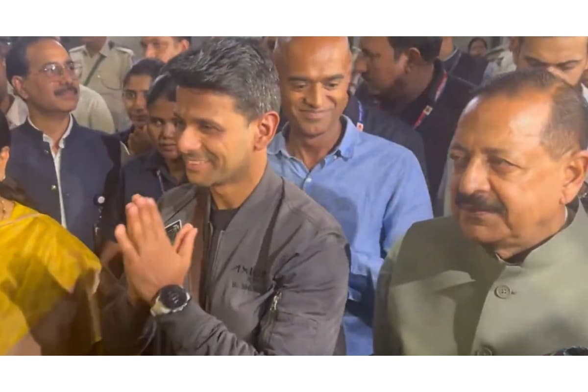 Group Captain Shukla (in grey blazer) was received at the Indira Gandhi International Airport by his family, political leaders and supporters, waving the tricolor.