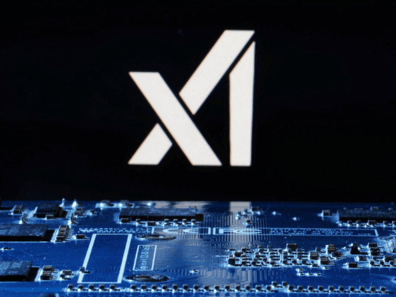 xAI logo is seen near computer motherboard in this illustration taken January 8, 2024. 
