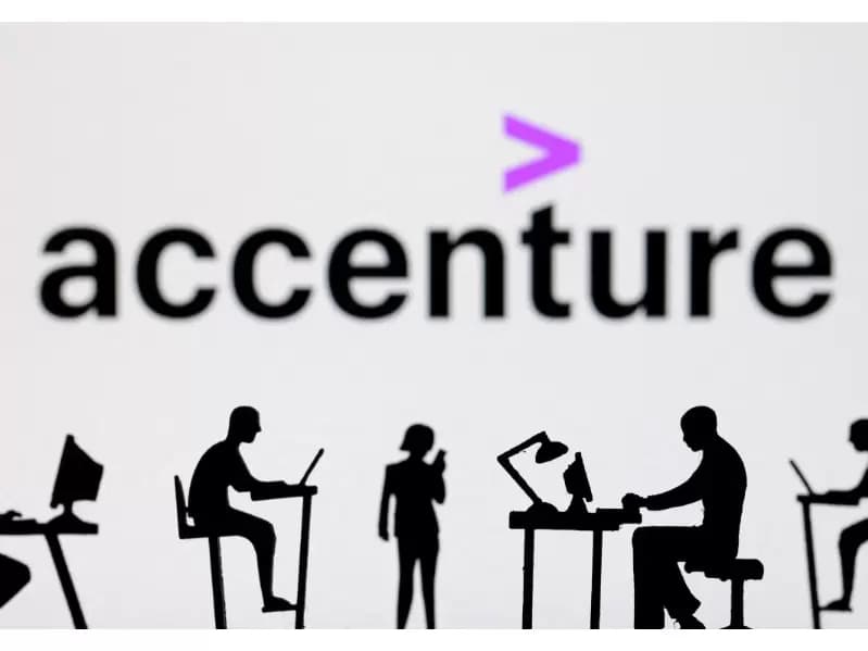  Figurines with computers and smartphones are seen in front of Accenture logo in this illustration taken, February 19, 2024. 