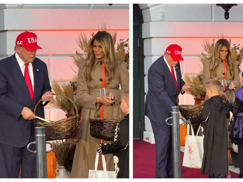 President Donald Trump and First Lady Melania Trump hand out candy to children during the White House Halloween celebration