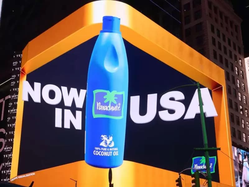 A digital display at New York’s Times Square features Parachute’s signature blue bottle