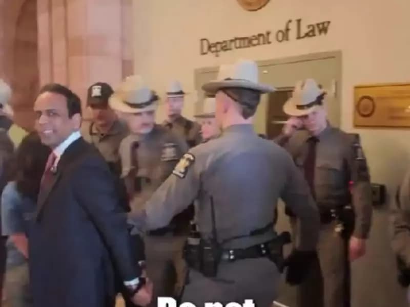 Raj Goyle being arrested at the State Capitol