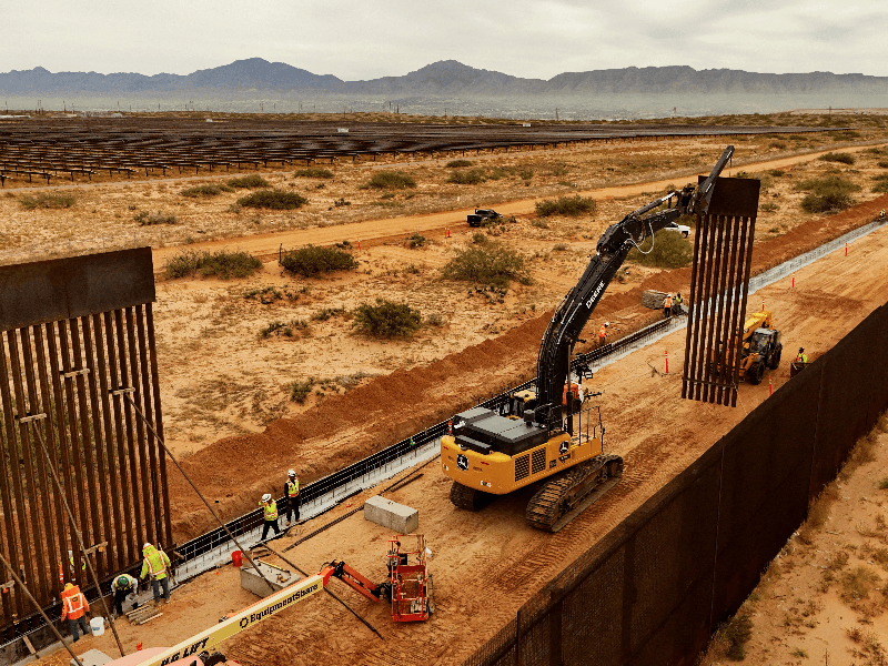 A drone view of machinery and workers during the construction of a new section of the border wall in Santa Teresa, New Mexico, on the U.S.-Mexico border, as seen from Ciudad Juarez, Mexico, Nov. 18, 2025. 