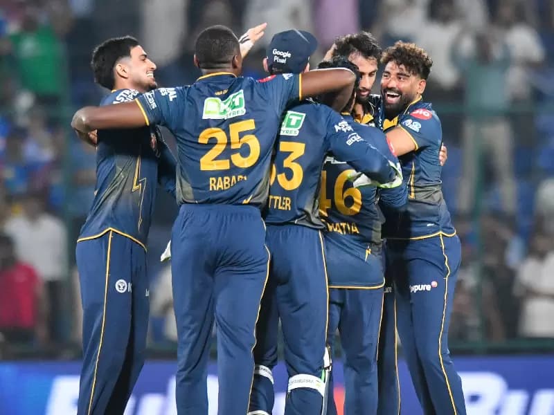 Gujarat Titans' Prasidh Krishna celebrates with teammates after the dismissal of Delhi Capitals' Vipraj Nigam during the Indian Premier League (IPL) 2026 match between Delhi Capitals and Gujarat Titans at Arun Jaitley Stadium in New Delhi on Wednesday, April 8, 2026. 