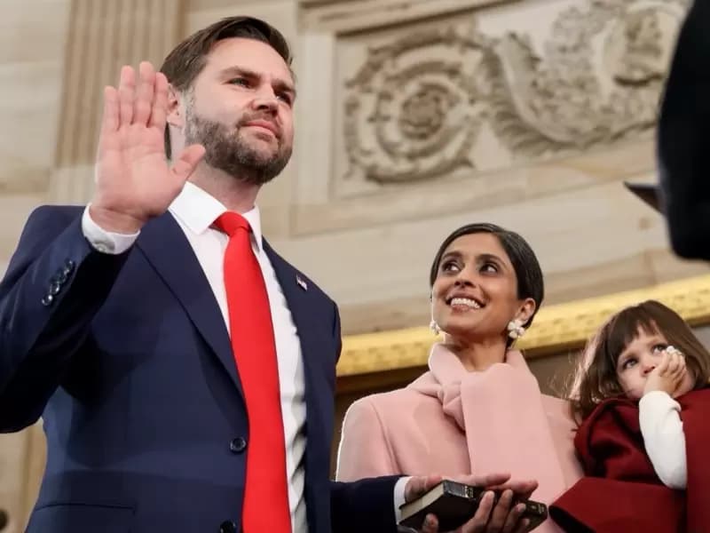 Vance looks on as her husband takes the vice presidential oath of office