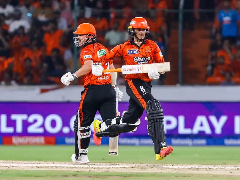 Sunrisers Hyderabad's Travis Head and Abhishek Sharma run between the wickets during the Indian Premier League (IPL) 2026 match between Sunrisers Hyderabad and Delhi Capitals at Rajiv Gandhi International Cricket Stadium in Hyderabad on Tuesday, April 21, 2026.