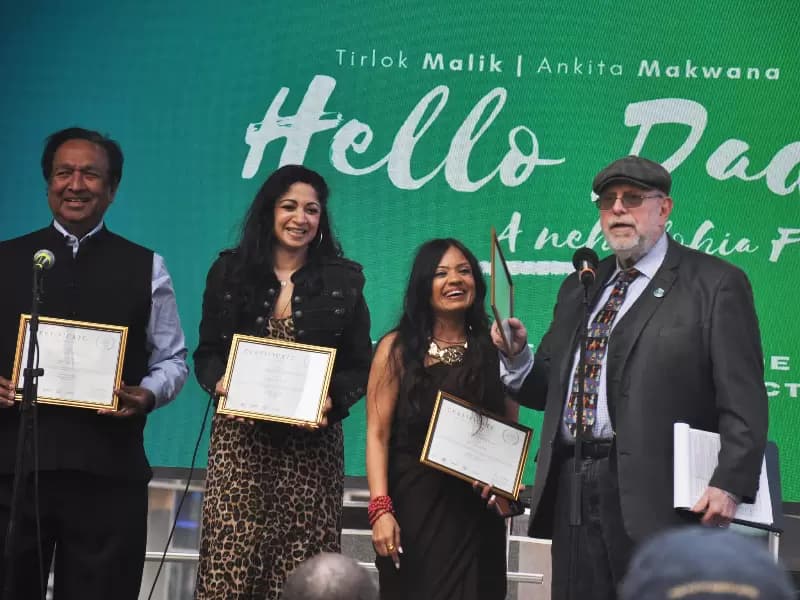 Filmmaker Neha Lohia (second from right) and the film's cast receiving the award.