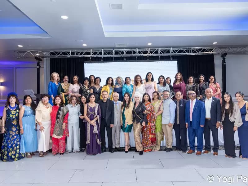 Attendees of the event posing for a photo