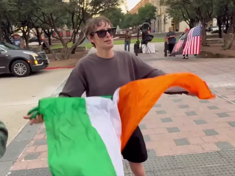 Man tearing the Indian Flag