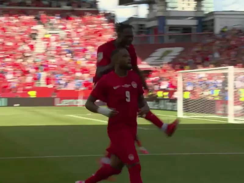 Canadian players celebrating after scoring the equalizer