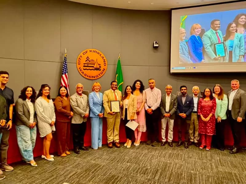 Kirkland Mayor Kelli Curtis presents the South Asian Heritage Month proclamation to the Indian Consulate.