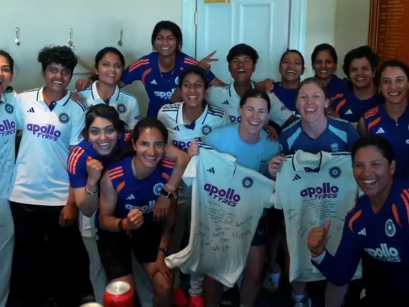 India players present signed jerseys to Heather Knight and Tammy Beaumont.