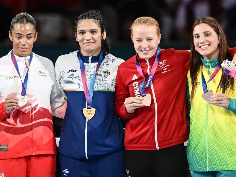 Gold medallist Arundhati Chaudhary of India, silver medallist Chantelle Reid of England, and bronze medallists Rosie Eccles of Wales and Lekeisha Pergoliti of Australia pose with their medals during the women's 70kg boxing medal ceremony at the Commonwealth Games 2026 in Glasgow, Scotland, on Saturday, August 1, 2026. 