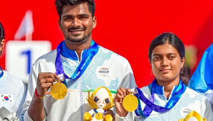 Gold medallist Sahil Jadhav and Chikitha Taniparthi of India pose for photos during the medal 