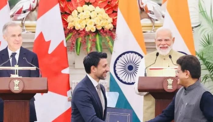 Indian Commerce and Industry Minister Piyush Goyal shaking hands with a Canadian official during the visit of Canadian Prime Minister Mark Carney and Indian Prime Minister Narendra Modi in March 2026.