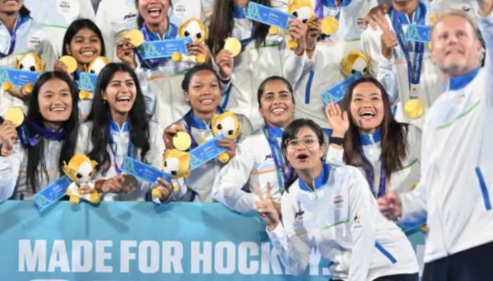 India’s women’s hockey team pose for a selfie with their gold medals and a board celebrating their qualification for the Los Angeles 2028 Olympics during the medal ceremony at the Asian Games in Gifu, Japan, on Friday, October 2, 2026. 