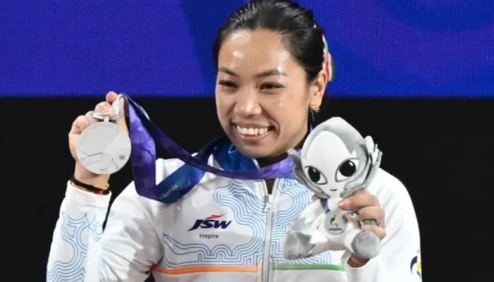  Nagoya: India's Mirabai Chanu poses for photos after winning the silver medal in the women’s 49kg weightlifting event during the medal ceremony at the Asian Games 2026 in Nagoya, Japan, on Wednesday, September 23, 2026. 