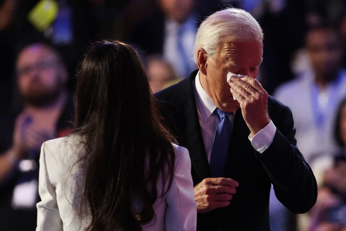 U.S. President Joe Biden wipes away a tear after being introduced by his daughter Ashley during Day one of the Democratic National Convention (DNC) in Chicago, Illinois, U.S., Aug.19, 2024.