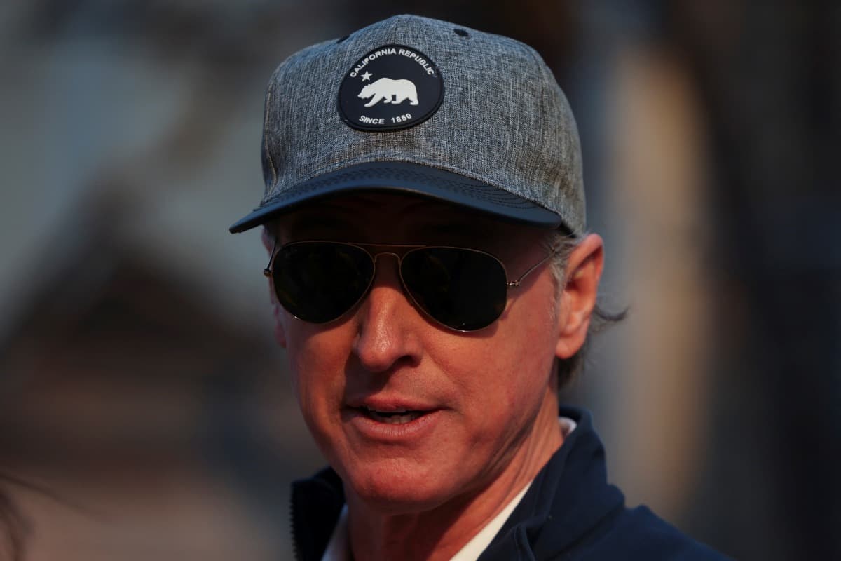 California Governor Gavin Newsom looks on as he visits the Pacific Palisades neighborhood, while powerful winds fueling devastating wildfires in the Los Angeles area force people to evacuate, in Los Angeles, California, U.S. January 8, 2025.