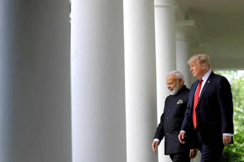 U.S. President Donald Trump (R) arrives for a joint news conference with Indian Prime Minister Narendra Modi (L) in the Rose Garden of the White House in Washington, U.S., June 26, 2017. REUTERS/Carlos Barria/File Photo