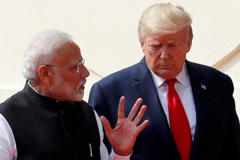 U.S. President Donald Trump and India's Prime Minister Narendra Modi talk as they arrive for a joint news conference after bilateral talks at Hyderabad House in New Delhi, India, February 25, 2020. REUTERS/Al Drago/File Photo