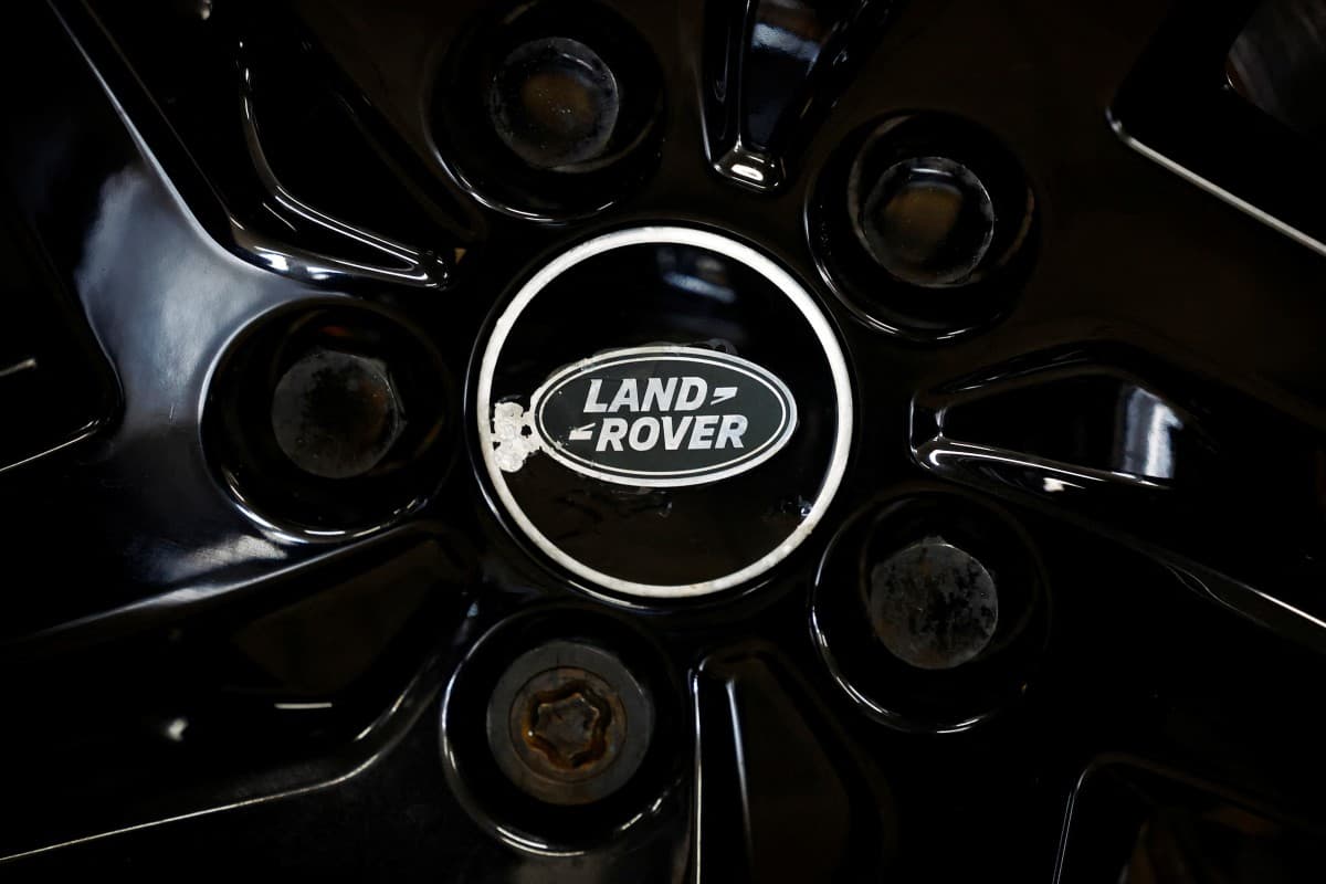 A logo of Land Rover is seen inside a car dealer in Nijmegen, Netherlands February 26, 2025.