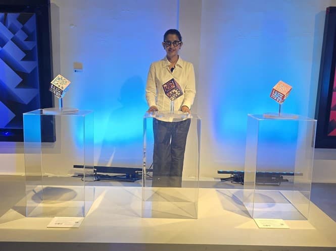 Lakshmi Mohanbabu with the three Deep Ocean Interactions Cubes at Gallery ART NOW during the milestone commemoration event on Mar.19, 2025.
