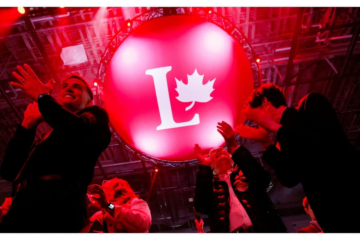 Supporters of Canada's Prime Minister Mark Carney react to polling numbers at the Liberal Party election night headquarters in Ottawa, Ontario, Canada April 28, 2025.