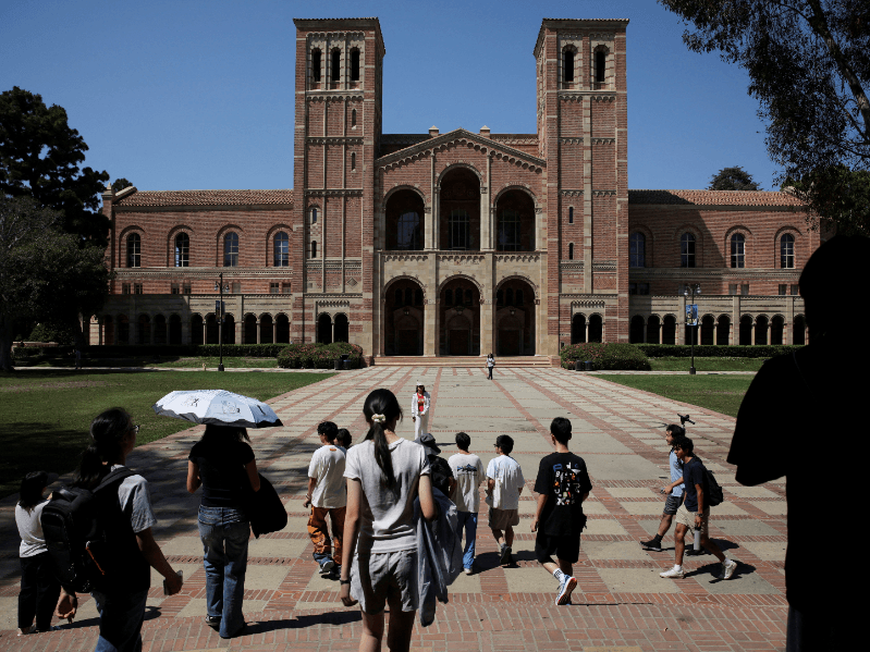 People walk through the campus of the University of California Los Angeles (UCLA) in Los Angeles, California, U.S., August 11, 2025.