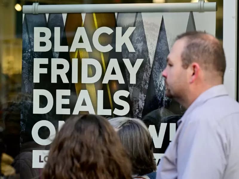 FILE PHOTO: A general view of a sign highlighting discounted items as Black Friday sales begin at The Outlet Shoppes of the Bluegrass in Simpsonville, Kentucky, U.S., November 26, 2021.