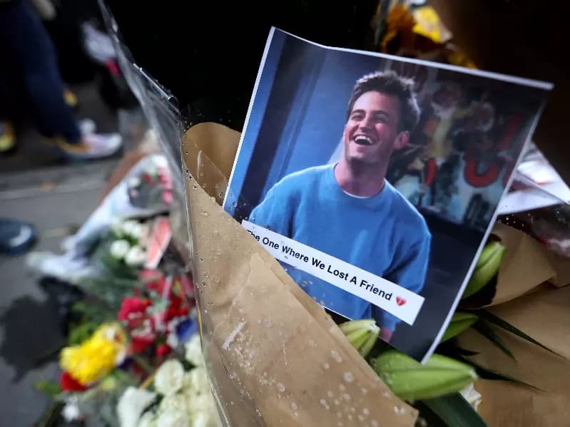 A makeshift memorial for actor Matthew Perry, the wise-cracking co-star of the 1990s hit television sitcom "Friends," who was found dead at his Los Angeles home October 28, is pictured on Bedford Street in Manhattan in New York City, U.S., October 30, 2023.