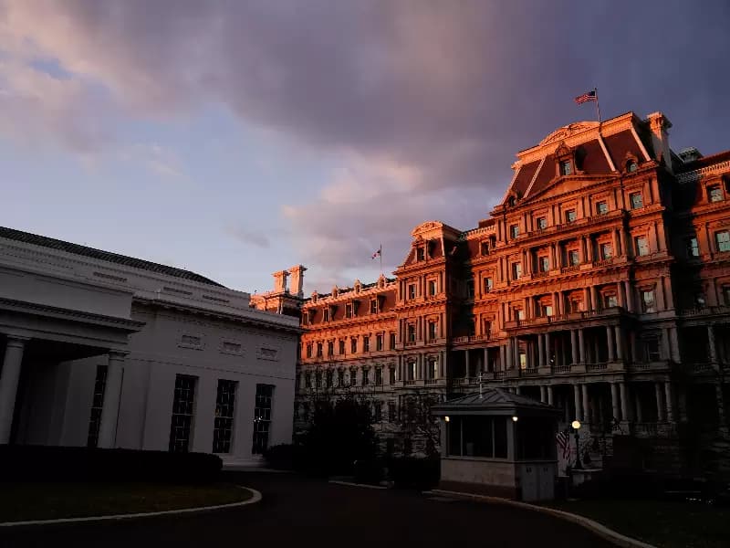 The West Wing of the White House and the Eisenhower Executive Office Building are seen at sunrise in Washington, U.S., Jan. 23, 2021.