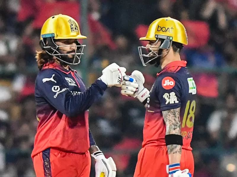 Royal Challengers Bengaluru's captain Rajat Patidar and Virat Kohli celebrate their partnership during the Indian Premier League (IPL) 2026 match between Royal Challengers Bengaluru and Lucknow Super Giants at M. Chinnaswamy Stadium in Bengaluru on Wednesday, April 15, 2026.