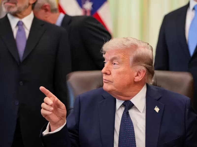 U.S. President Donald Trump points a finger as he participates in a healthcare affordability event in the Oval Office at the White House in Washington, D.C., U.S., April 23, 2026.