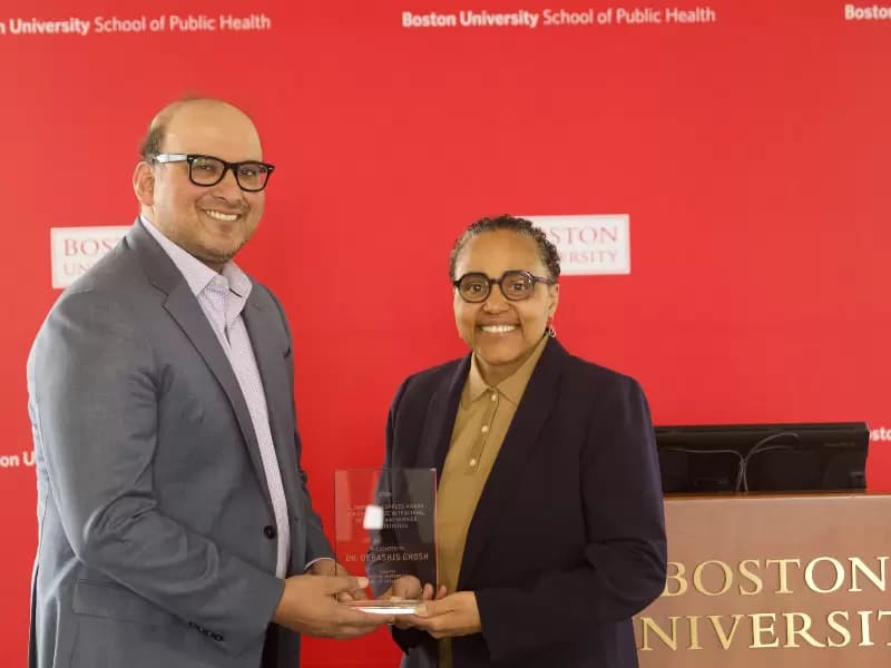 Scarlett Bellamy, right, chair and professor of biostatistics at SPH, presents Debashis Ghosh with the 2026 L. Adrienne Cupples Award. Photo: Megan Jones